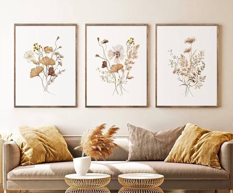 Create a gallery wall featuring botanical prints in your earthy living room