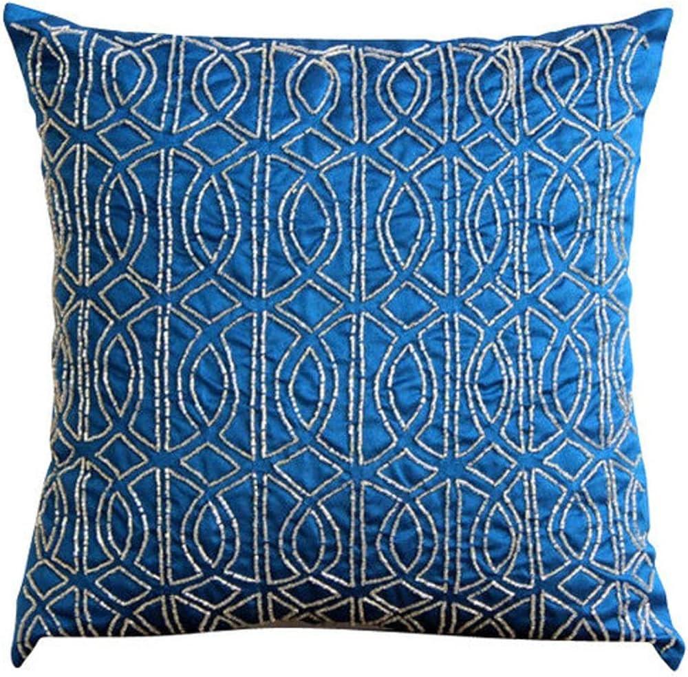 Decorate with blue-patterned​ throw pillows for a pop of personality